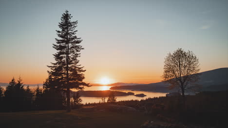 Timelapse-of-vivid-colours-of-a-warm-sunset-or-sunrise-of-islands-and-oceans-in-Bowen-Island,-British-Columbia,-Canada