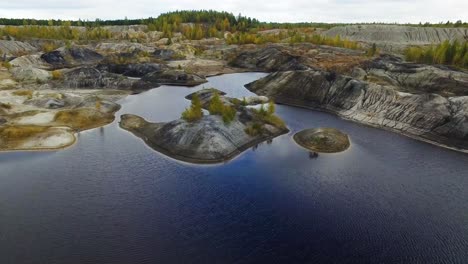 aerial view of a quarry landscape with water features