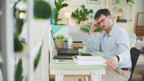 confident businessman analyzes documents