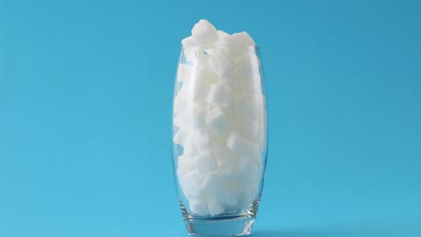 Glass full of sugar cubes