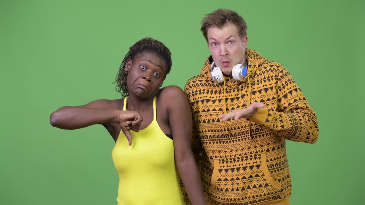 Young multi-ethnic couple having different decisions