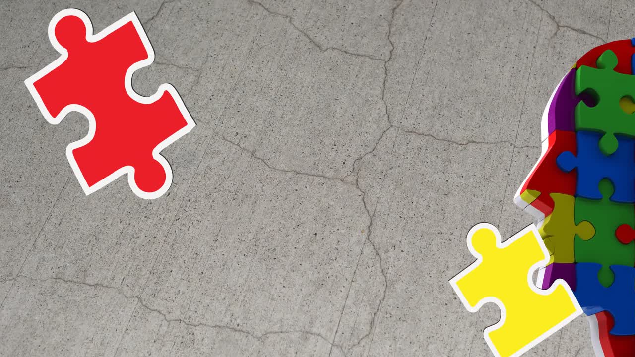 animación de piezas de rompecabezas verdes, amarillas y rojas que caen sobre el modelo de cabeza humana con rompecabezas