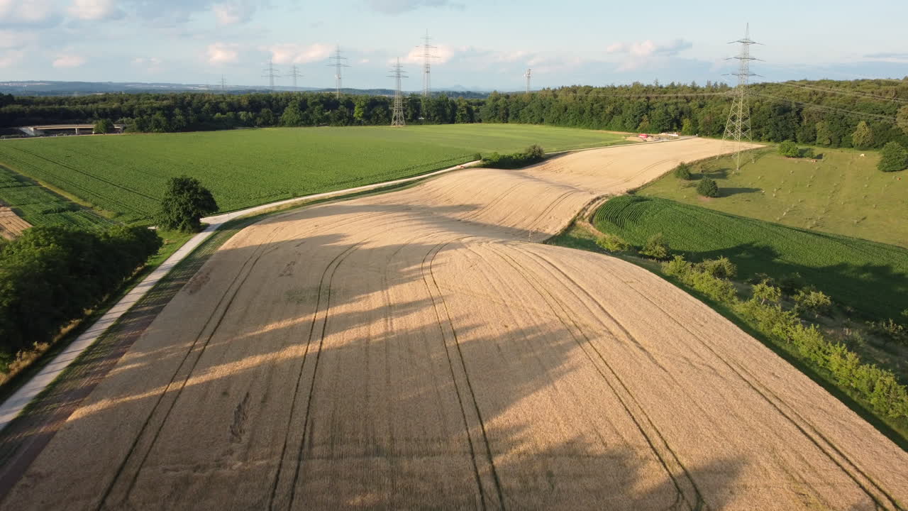 Aerial view of agricultural fields and power lines