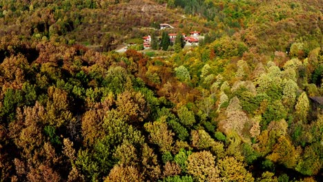 autumn colour forest remote mountain village rural bulgaria drone shot