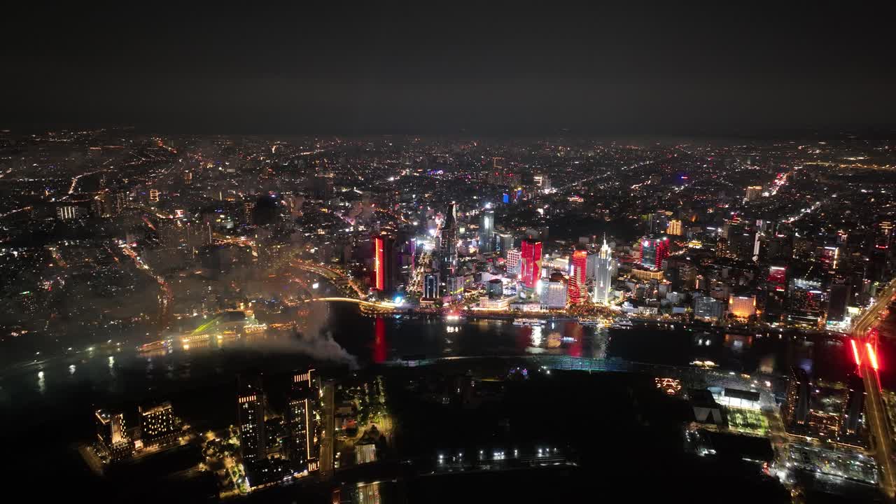 Downtown Ho Chi Minh City At Night From Thu Thiem In Vietnam. - aerial shot