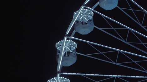 Night-view-of-big-wheel-in-Grande-Motte,-France