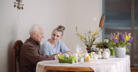 Woman-Spending-Time-With-Grandfather-1