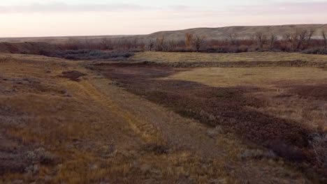 drone footage of the country over prairie land near alberta canada