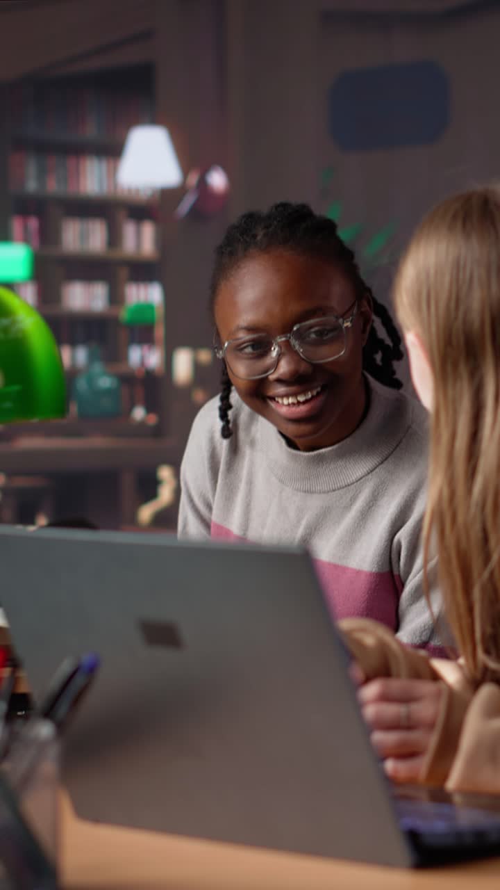 Vertical video female student reading and writing detailed notes for an exam