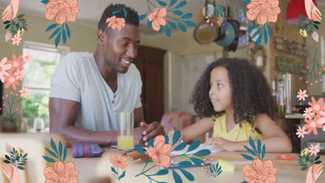 Animation-of-flowers-over-african-american-father-doing-homework-with-his-daughter