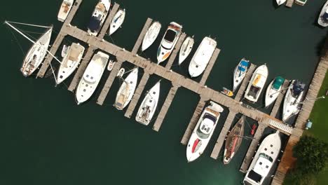 aerial shot over a marina filled with sailboats