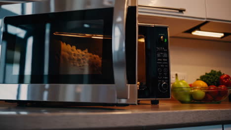 modern kitchen microwave with food