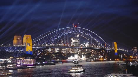 Boats-passing-the-Harbour-bridge-during-Sydney's-Vivid-light-festival