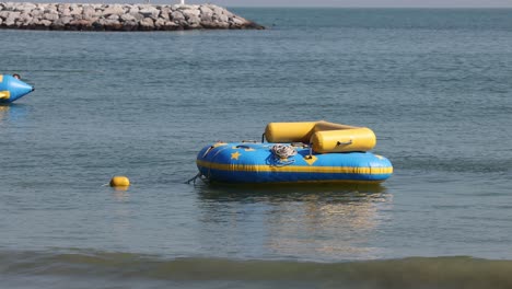 inflatable structures floating on a calm lake