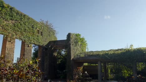 Okinawa-Tropical-Dream-Center-brick-walls-and-fountain-at-Naga-Prefecture-Summer-time-tilt-shot-hot-peaceful-zen-Japan-garden-ecology-environment