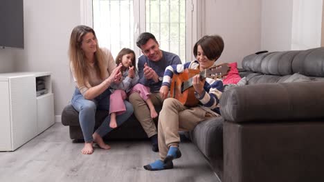 family enjoying music at home