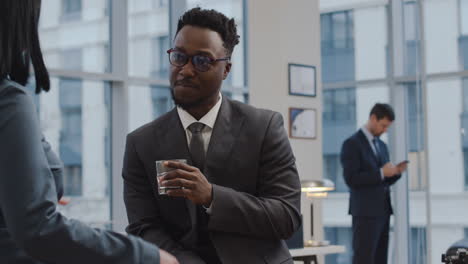 two people relaxing at the office