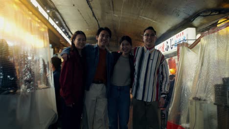 group of friends at a night market