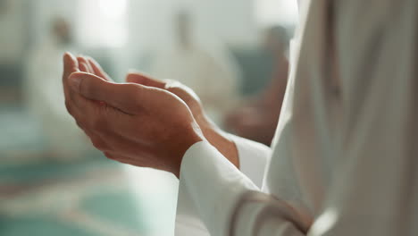 Muslim,-praying-and-hands-in-a-Mosque