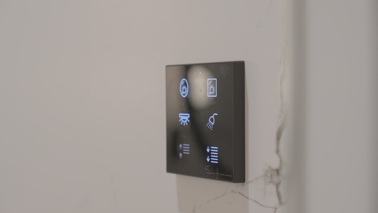 Modern control panel mounted on a wall for home automation functions