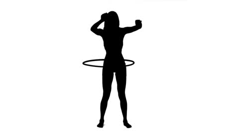 Silueta-De-Una-Mujer-Usando-Un-Hulahoop-En-Cámara-Lenta