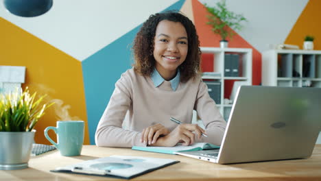 young woman working at a modern office