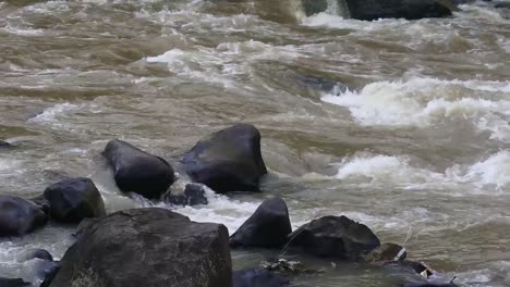 Water-flows-in-the-rocky-river-in-slow-motion--HD-video