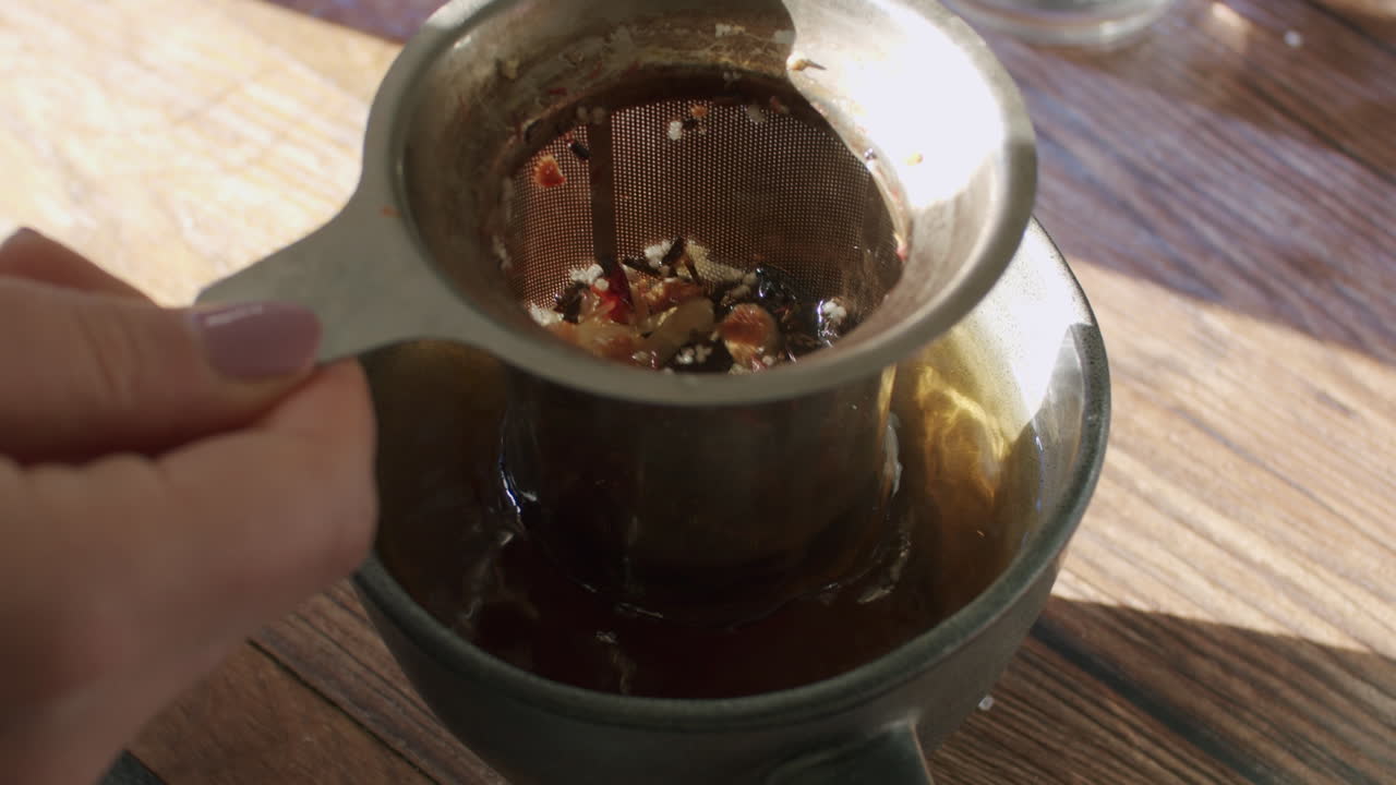 Brewing herbal tea with strainer