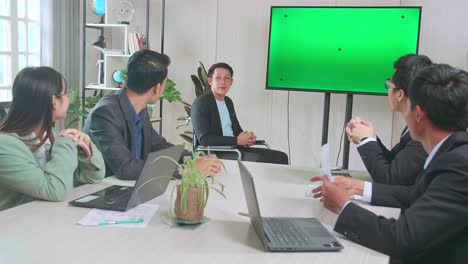 business meeting with presentation and applause