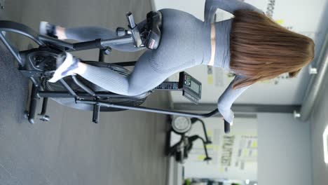 of a young girl doing cardio in the gym sexy figure of a girl of a young girl doing cardio in the gym sexy figure of a girl healthy lifestyle