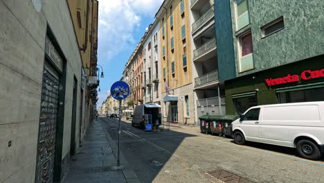 urban street view with parked cars and buildings