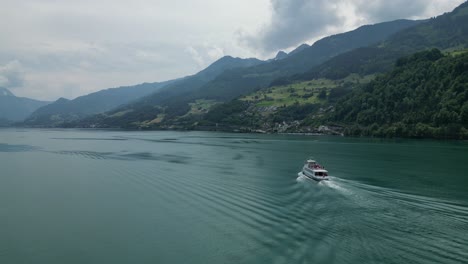 peaceful boat cruise travel in walensee lake as part of switzerland tourism