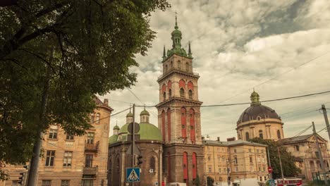 Time-lapse-of-moving-clouds-over-the-church-in-city-Lviv,-Ukraine.-Central-part-of-old-city