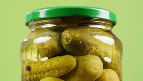pickled cucumbers in a jar