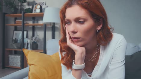 close up depressed woman thinks about psychological problems looking away alone