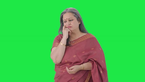 Confused-Indian-old-woman-thinking-Green-screen