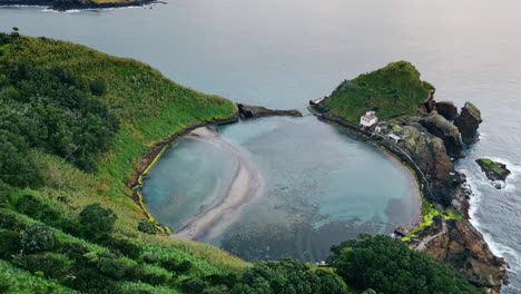 drone beautiful sea bay view. picturesque green island with turquoise lagoon