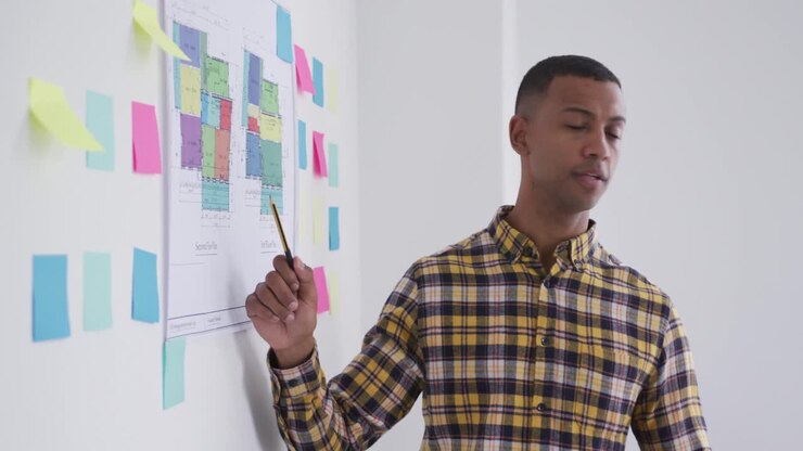 Mixed race man presenting his ideas