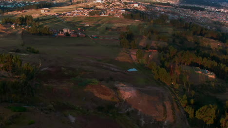 Aerial-over-Cusco-in-Peru-reveals-the-Pillku-Urqu-Mountain-on-the-horizon