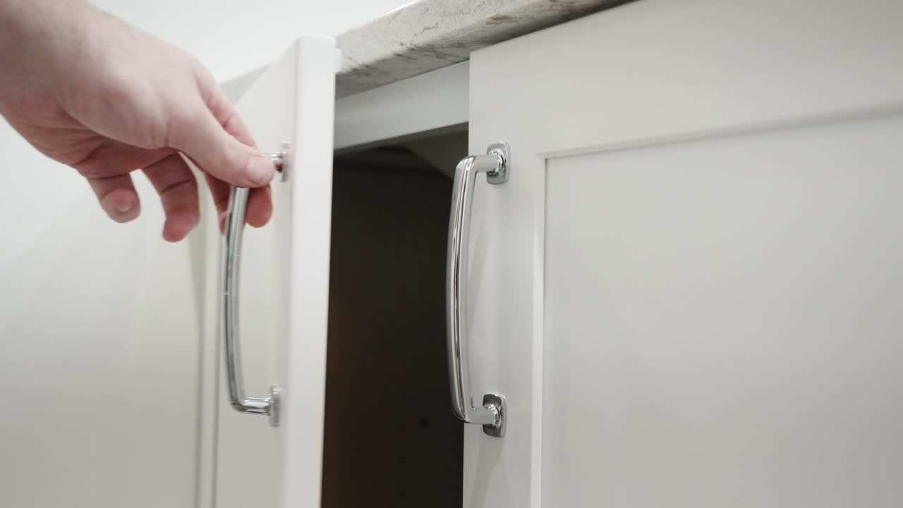 Opening up a freshly installed cabinet.