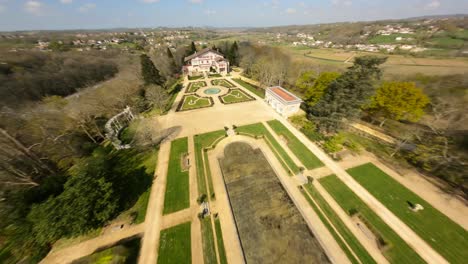 Geometric-shapes-and-fountains-in-gardens-of-Villa-Arnaga,-Cambo-les-Bains-in-Pyrenees-Atlantiques,-Nouvelle-Aquitaine-in-France