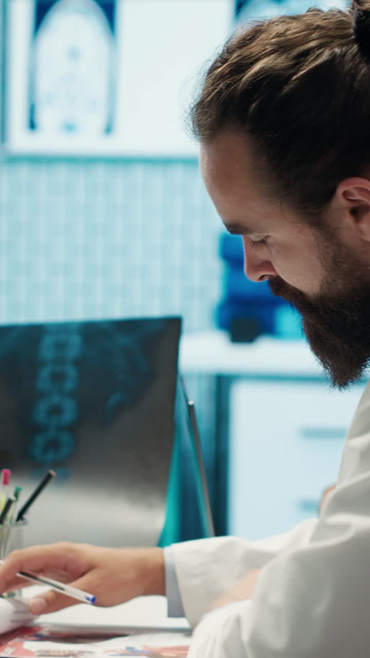 Vertical Video Medical professionals analyzing anatomy x ray scans to find the best treatment