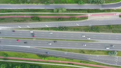 Aerial-view-over-a-highway-interchange-during-peak-hour-traffic