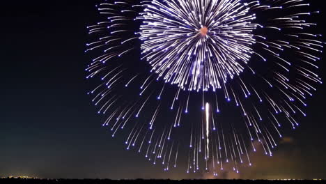 Vibrant Blue Fireworks Display in the Night Sky