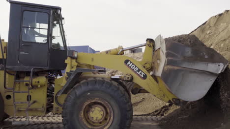 construction site with excavator and dump truck