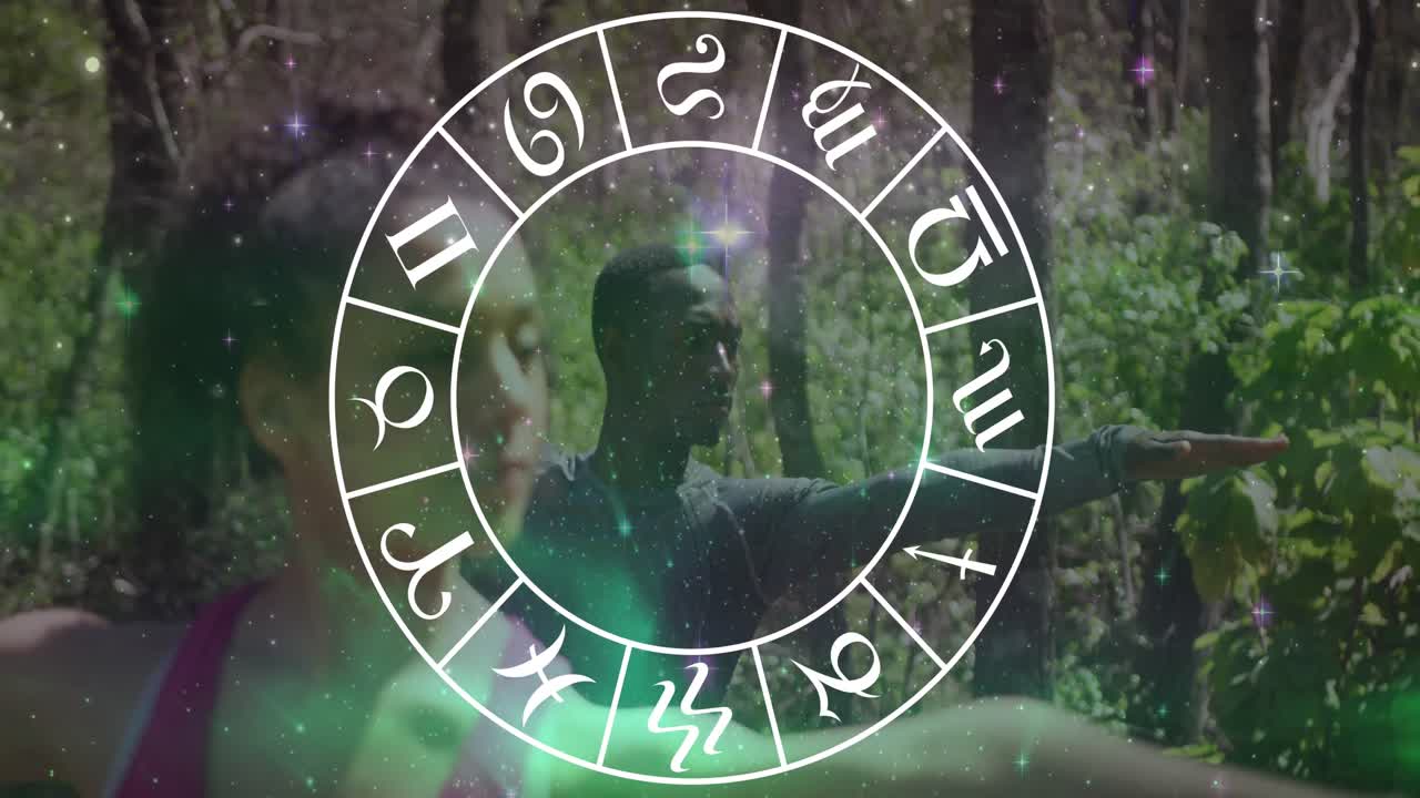 요가를 연습하는 아프리카계 미국인 부부 위의 조디악 기호의 원