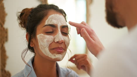 Comic-couple,-facial-and-skin-care-in-bathroom