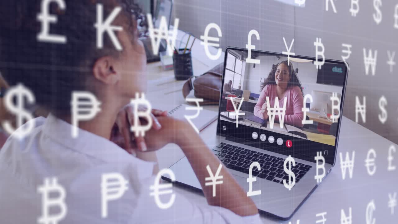 Mid-adult woman on laptop listening as advisor speaking for finance, currency icons drifting