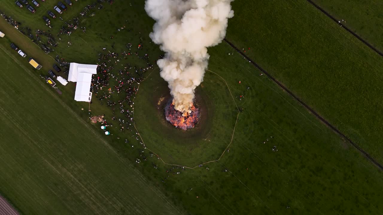 Aerial View of a Large Bonfire Gathering
