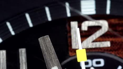 the number 12 on the wristwatch on a macro shot